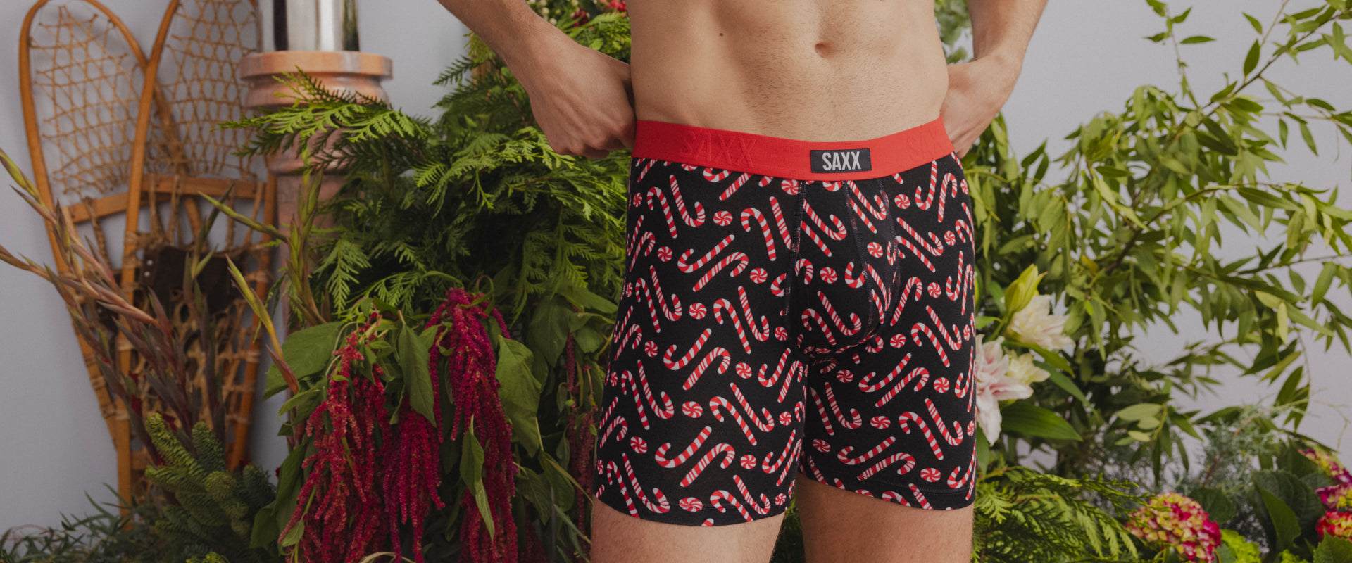 A close up image of a pair of underwear with candy canes printed on them.