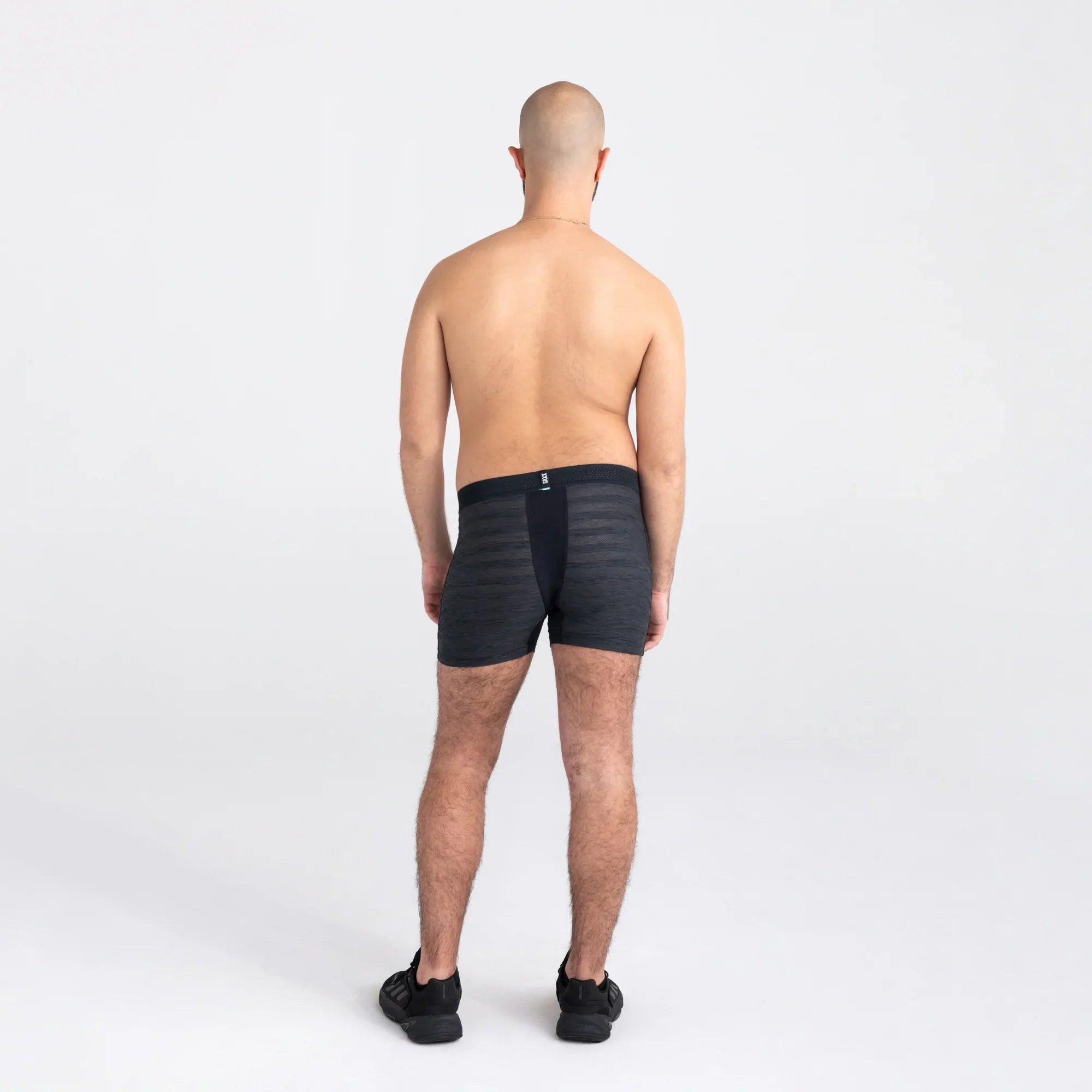 Back - Model wearing DropTemp Cooling Mesh Boxer Brief Fly in Black Heather