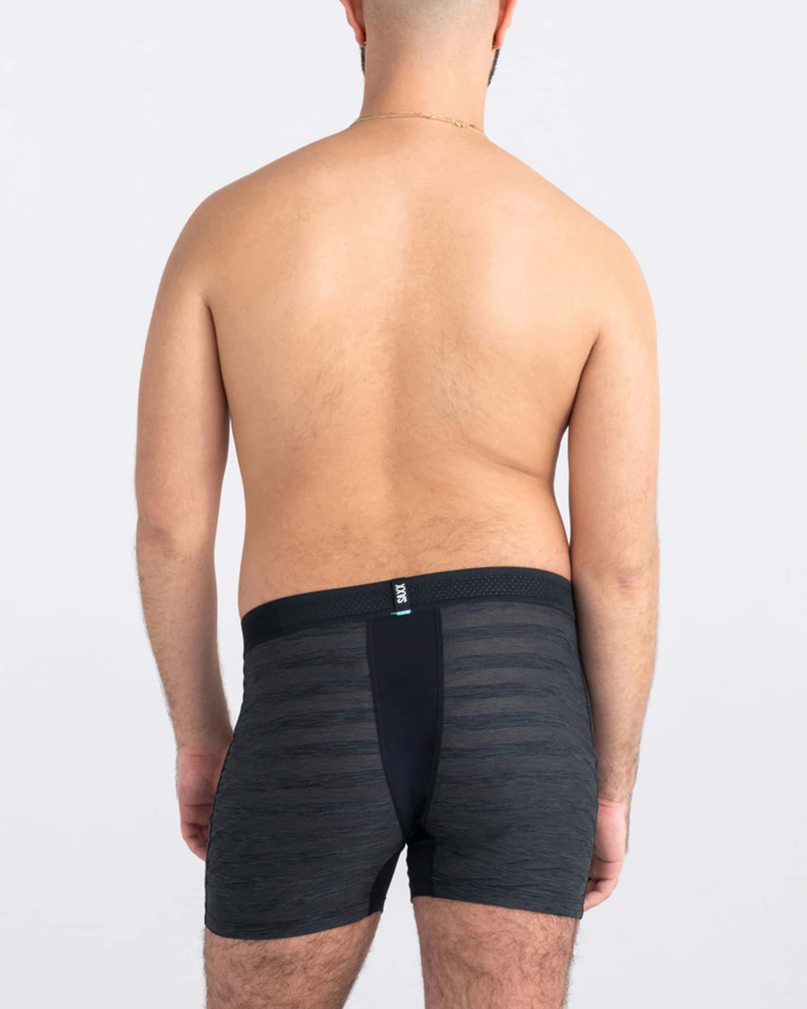 Back - Model wearing Droptemp Cooling Mesh Boxer Brief Fly in Black Heather