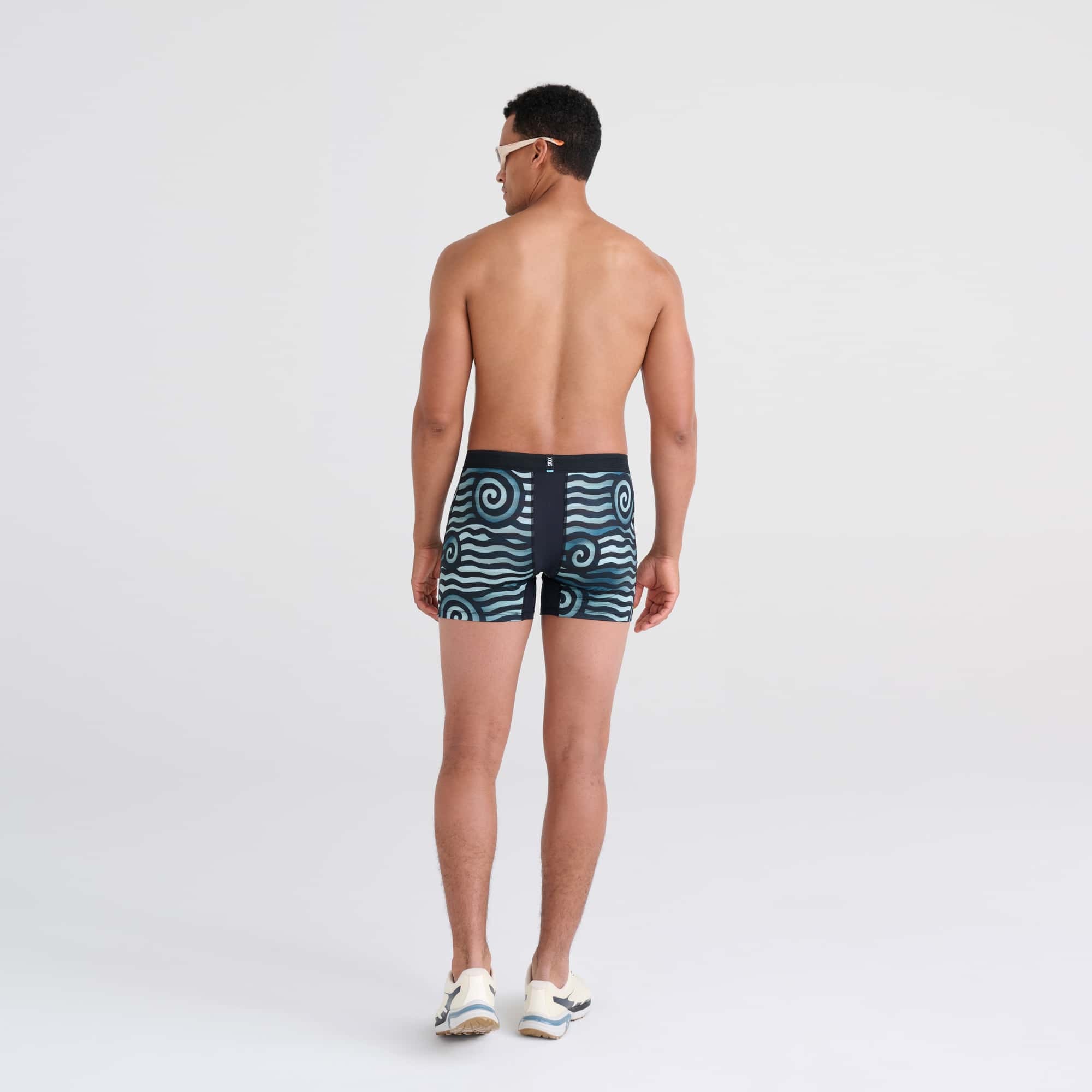 Back - Model wearing DropTemp Cooling Mesh Boxer Brief in Rip Tide Stripe- Navy Blue