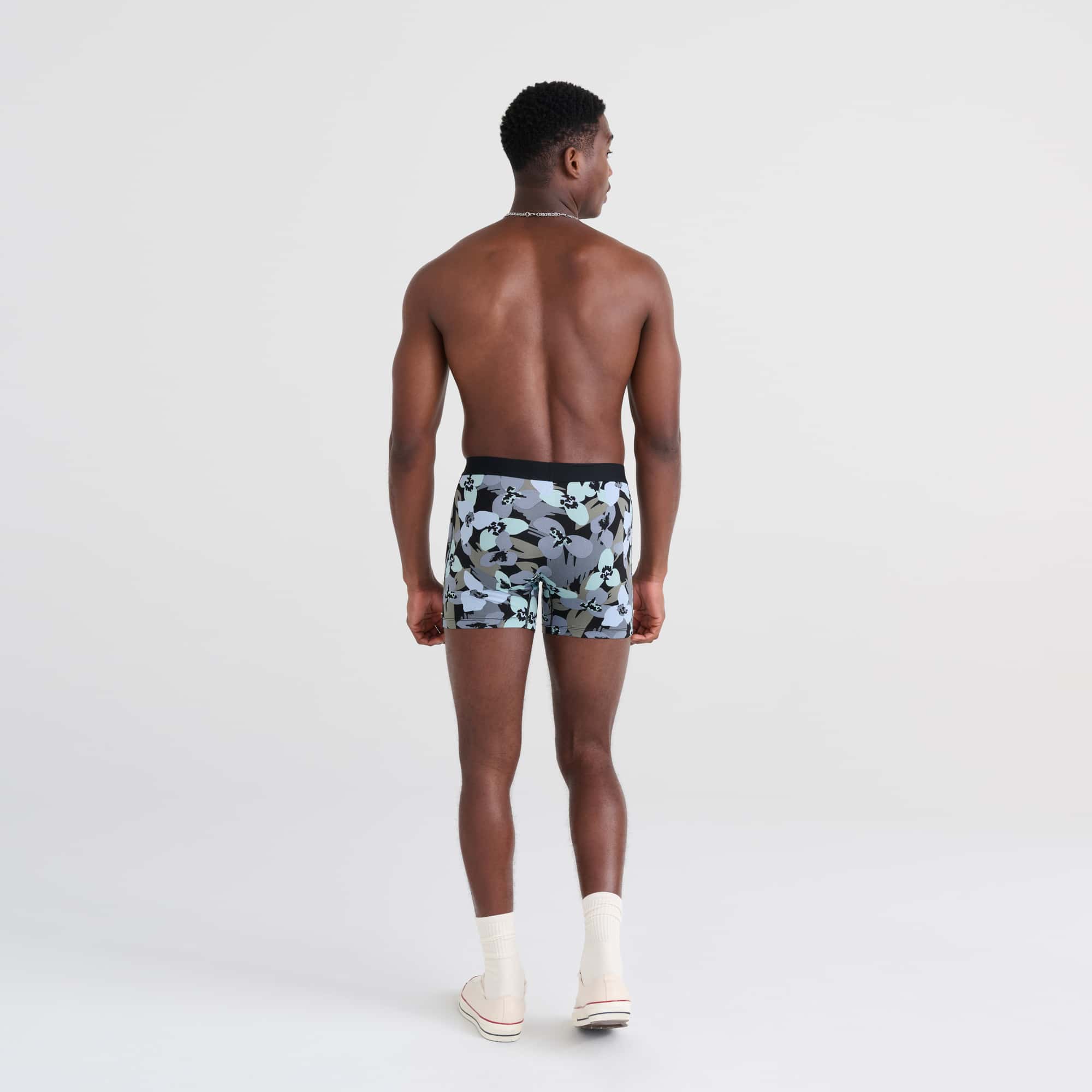 Back - Model wearing Daytripper Boxer Brief in Camo Flowers- Blue Fog