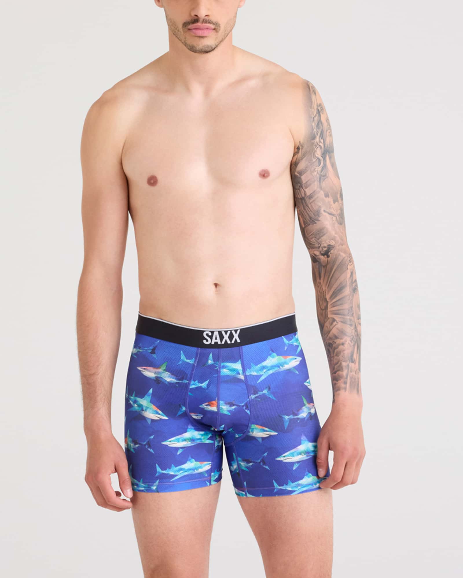 Front - Model wearing Volt Breathable Mesh Boxer Brief in Shattered Sharks-Blue