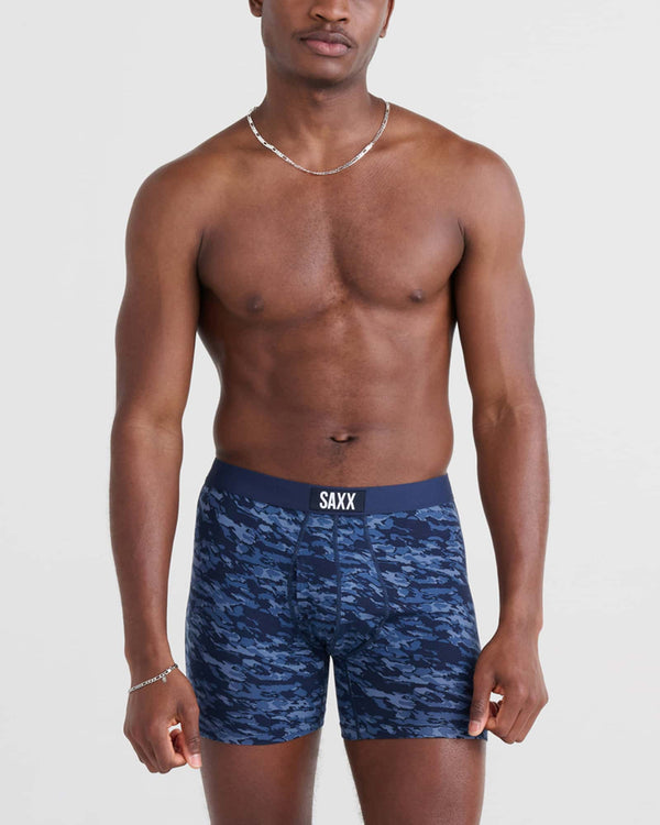 Front - Model wearing Ultra Super Soft Boxer Brief Fly in Basin Camo- Navy