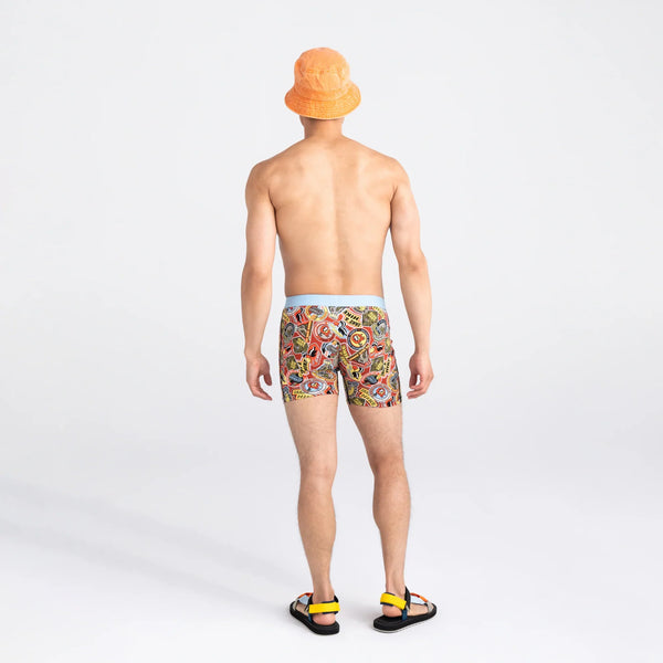 Back - Model wearing Ultra Super Soft Boxer Brief Fly in Demerit Badges- Multi