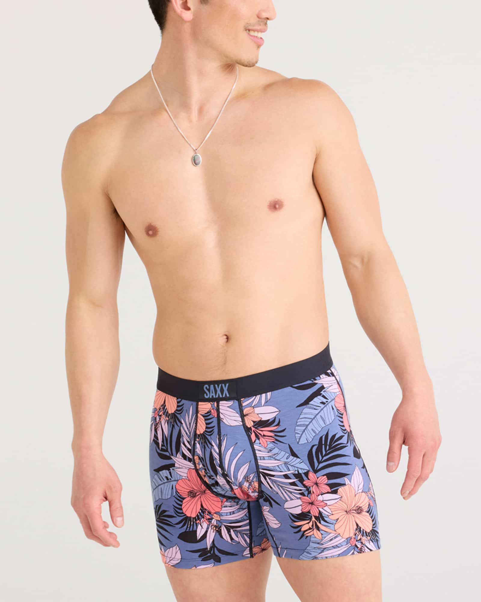 Front - Model wearing Ultra Super Soft Boxer Brief Fly in Hibiscus Jungle-Blue