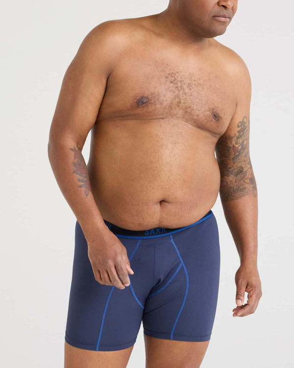 Front - Model wearing Kinetic Light-Compression Mesh Boxer Brief in Navy/City Blue