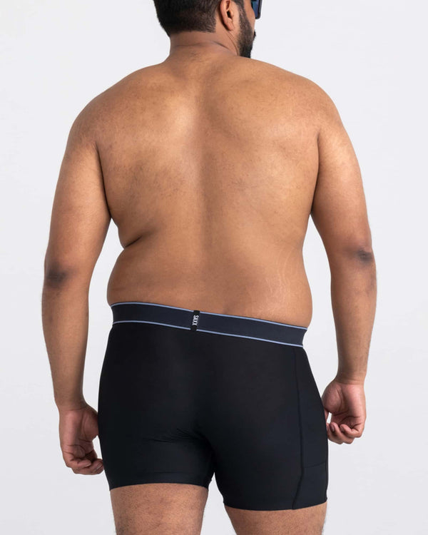 Back - Model wearing Droptemp Cooling Hydro Liner in Black