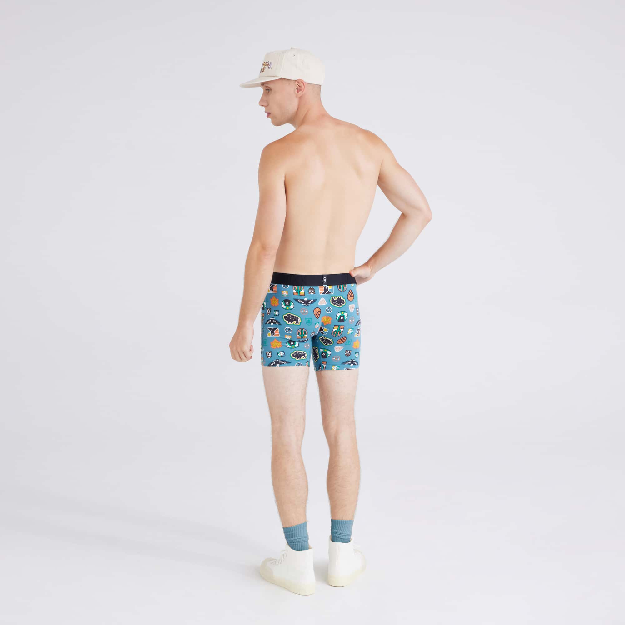 Back - Model wearing Droptemp® Cooling Cotton Boxer Brief in Outside Is In-Hydro Blue