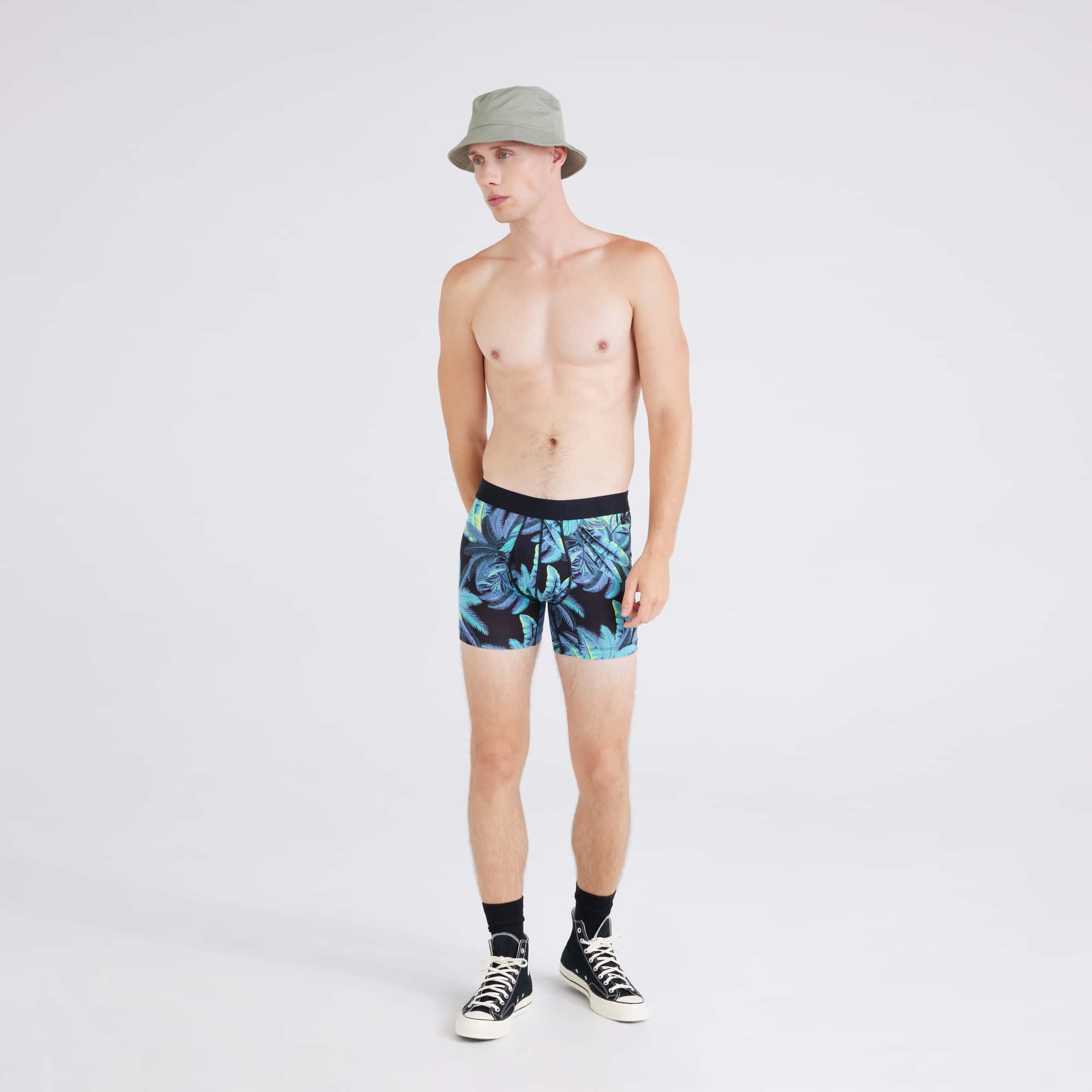 Front - Model wearing  Droptemp® Cooling Cotton Boxer Brief in Tropical Jungle-Blue