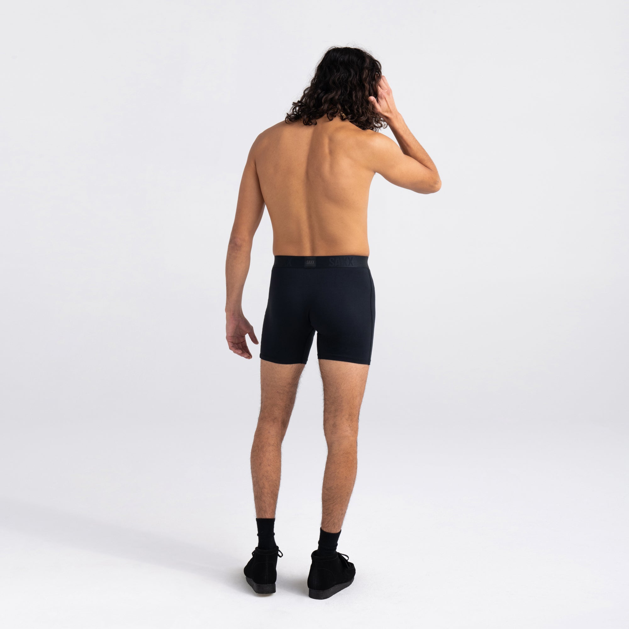 Back - Model wearing 22nd Century Silk Boxer Brief in Black