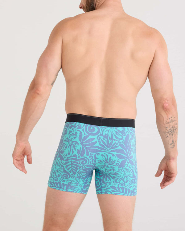 Back - Model wearing Quest Quick Dry Mesh Baselayer Boxer Brief Fly in Surf Flowers-Turquoise