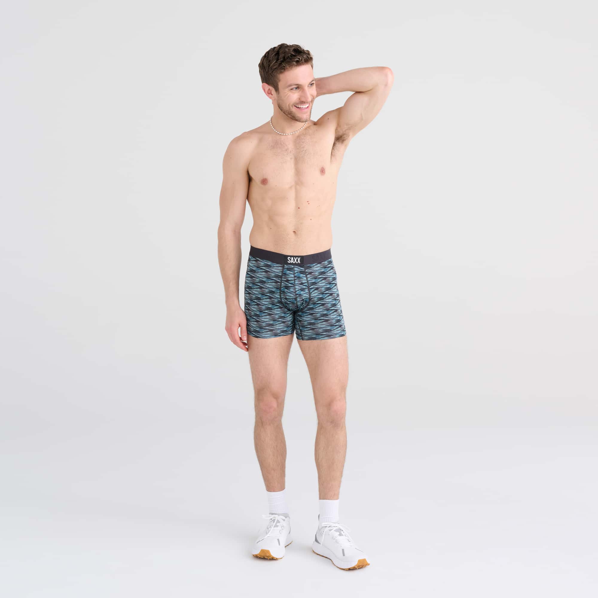 Front - Model wearing Vibe Boxer Brief in Action Spacedye- Washed Teal