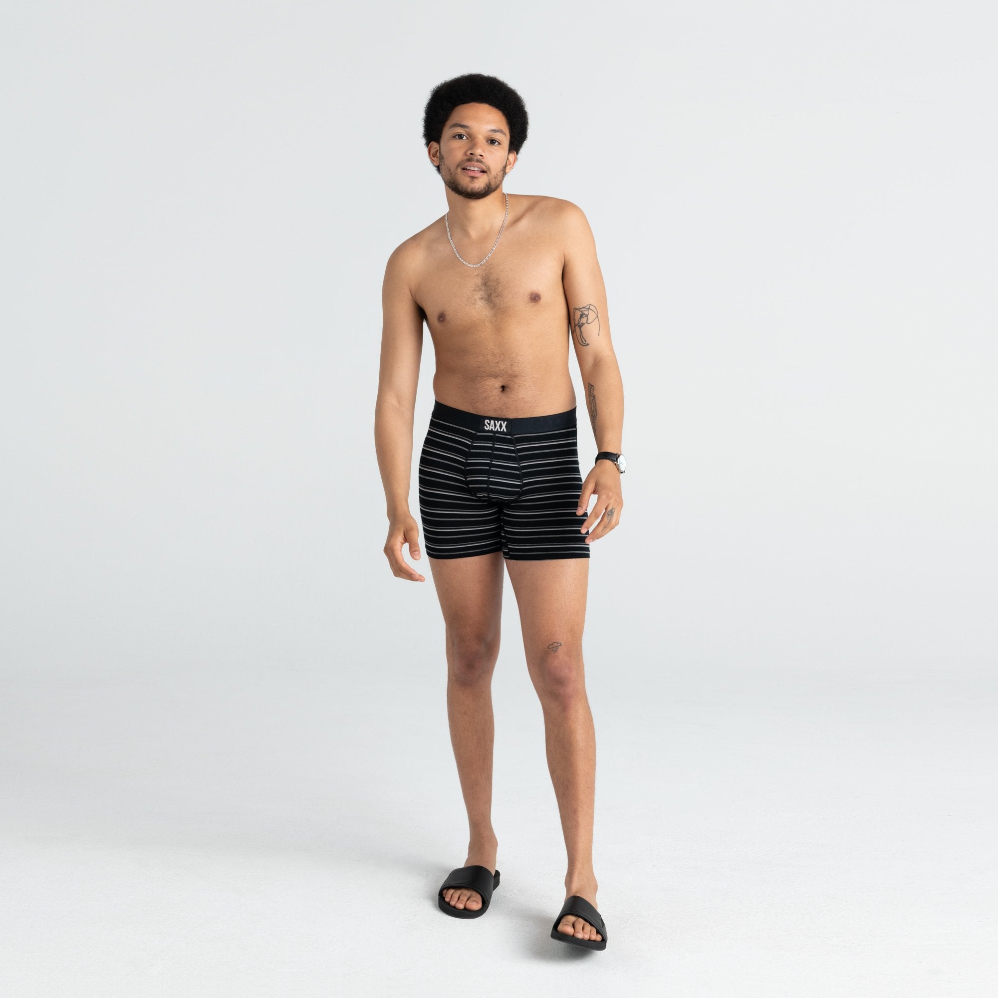 Front - Model wearing Vibe Boxer Brief in Black Coast Stripe