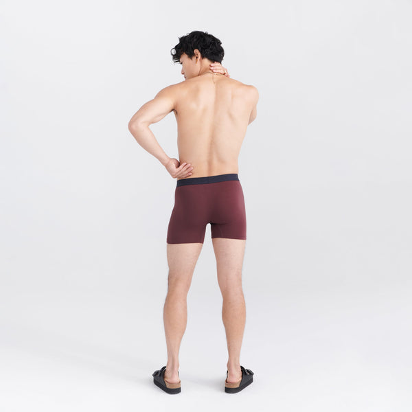 Back - Model wearing Vibe Super Soft Boxer Brief in Fudge