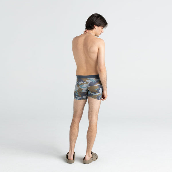 Back - Model wearing Vibe Boxer Brief in Graphite Stencil Camo