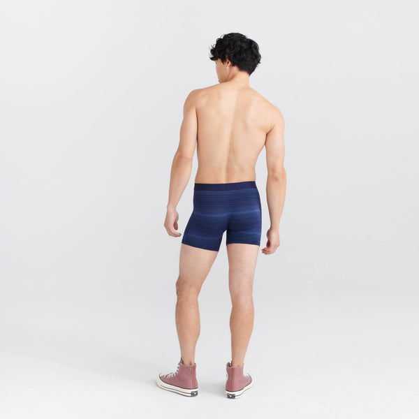 Back - Model wearing Vibe Super Soft Boxer Brief in Variegated Stripe- Maritme