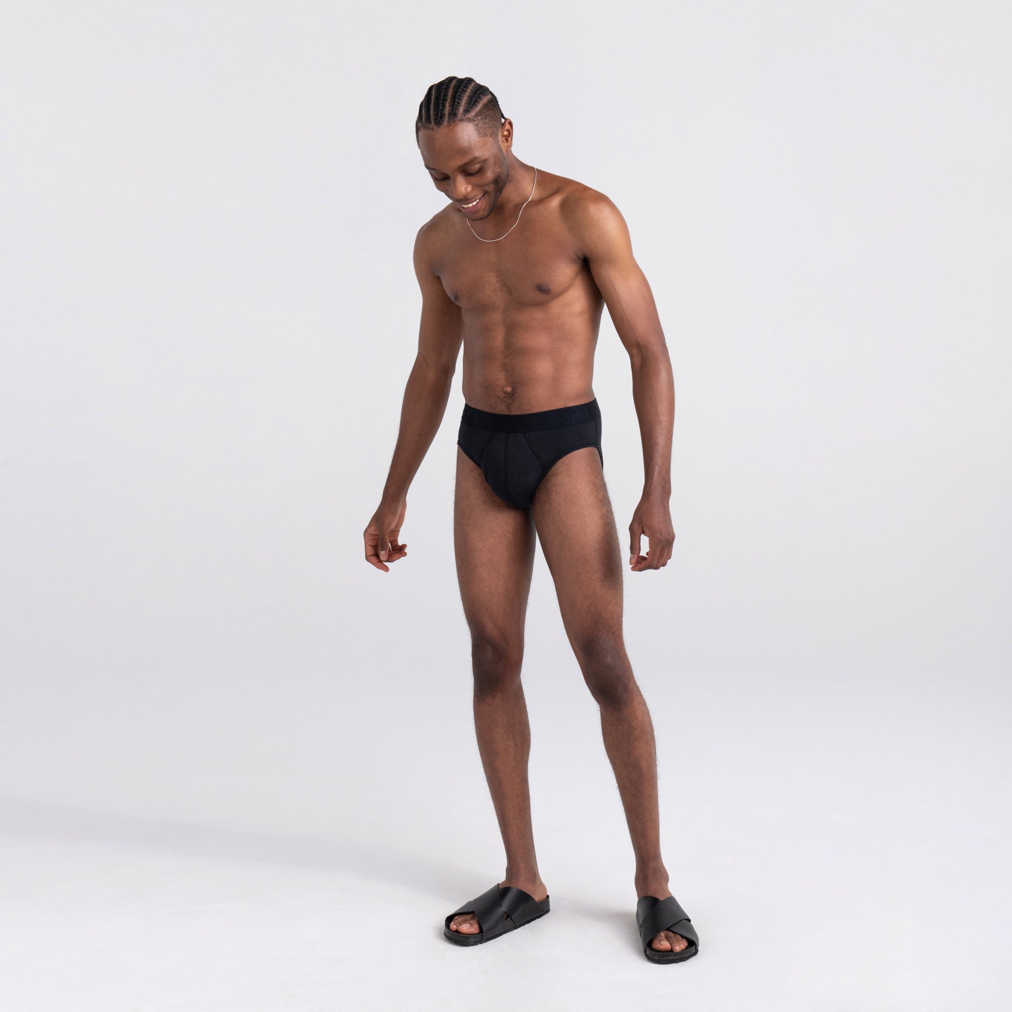 Front - Model wearing DropTemp Cooling Cotton Brief in Black