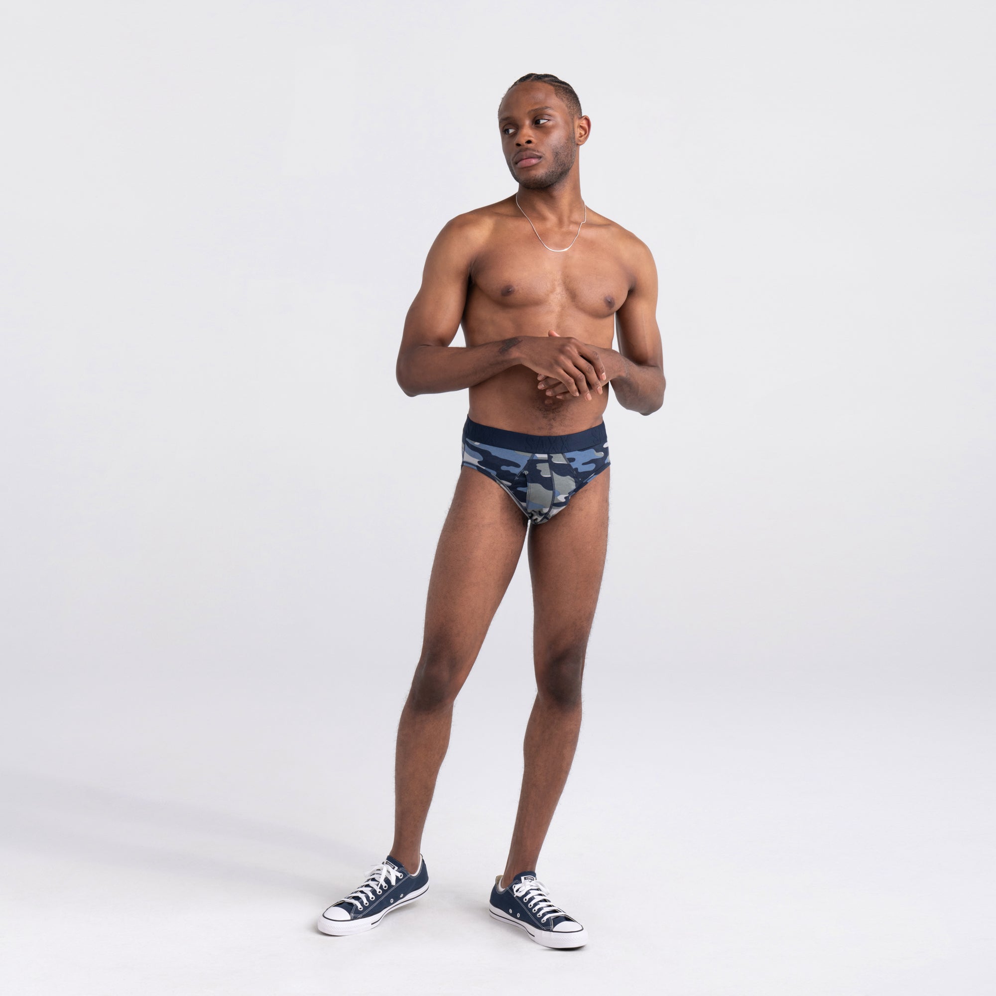 Front - Model wearing DropTemp Cooling Cotton Brief in Tidal Camo- Blue