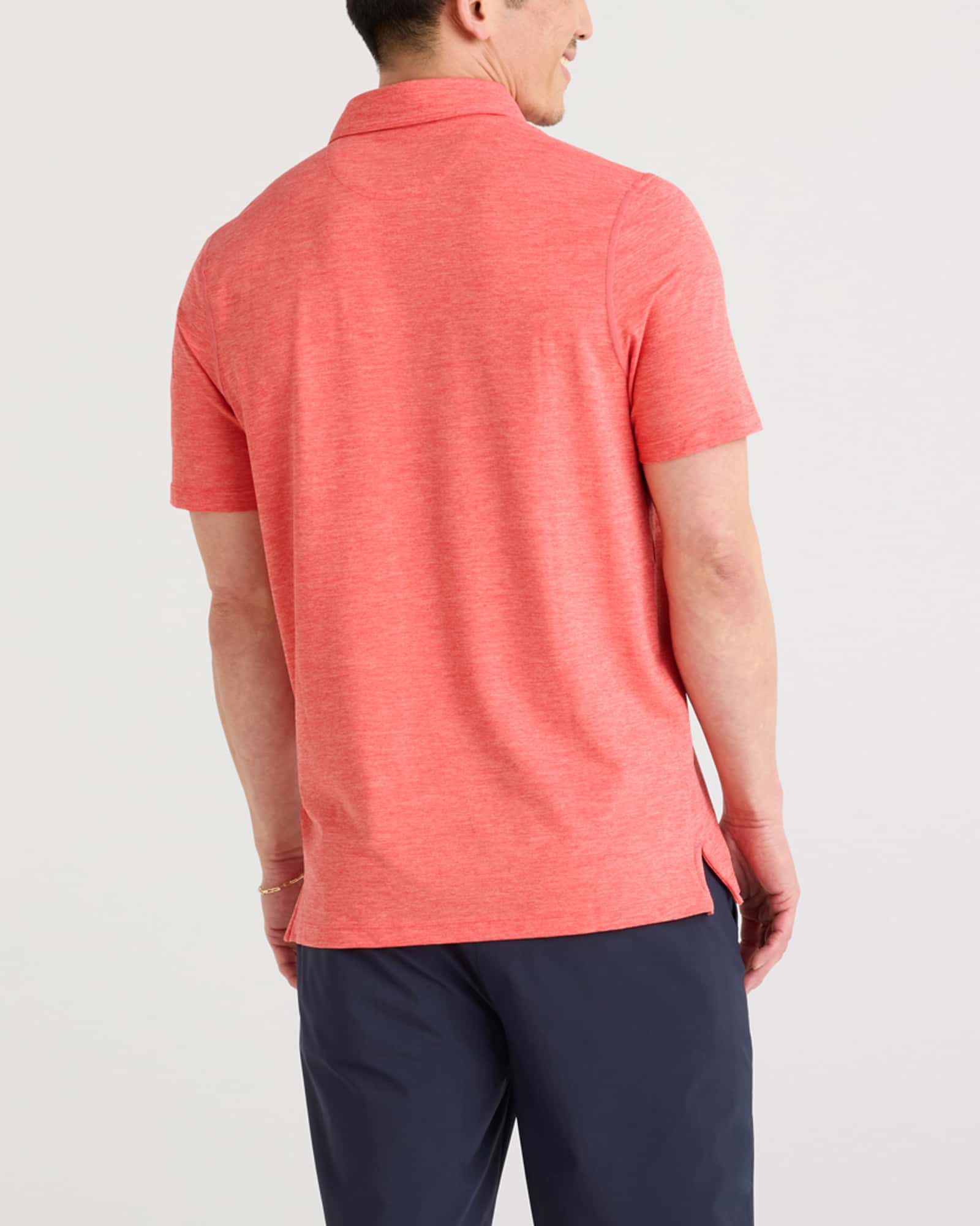 Back - Model wearing Droptemp All Day Cooling Polo in Coral Red Heather