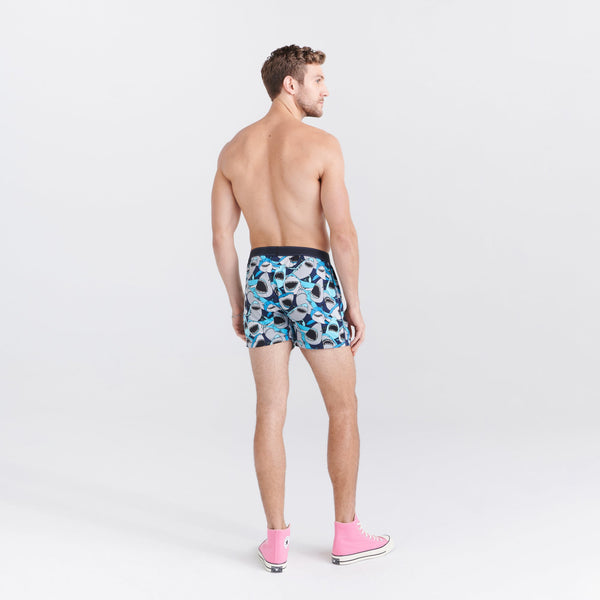 Back - Model wearing Daytripper Loose Boxer Fly in Shark Tank Camo- Navy