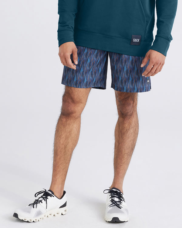 Front - Model wearing  3Six Five Lounge Hoodie in Storm and Multi-Sport 2N1 Short Regular in Brushed Ikat-Turbulence