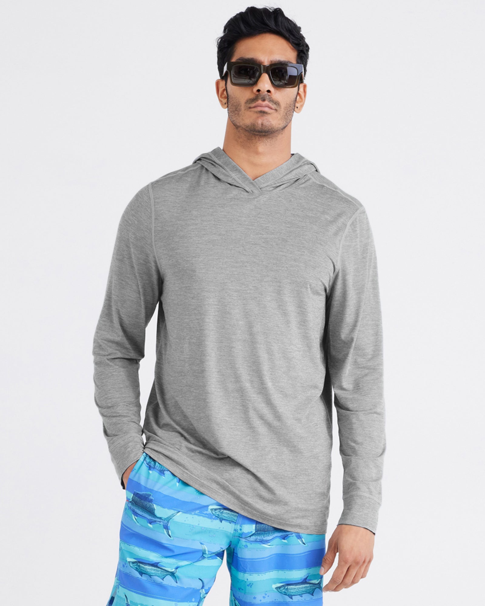 Front - Model wearing  Droptemp® All Day Cooling Hoodie in Tradewinds Heather