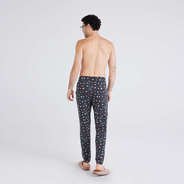 Back - Model wearing Snooze Sleep Pant in Junk Man-Black