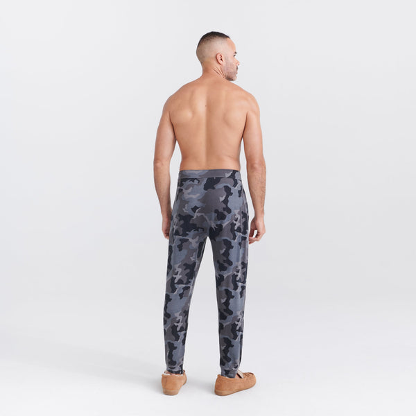 Back - Model wearing Snooze Sleep Pant in Supersize Camo- Dark Charcoal