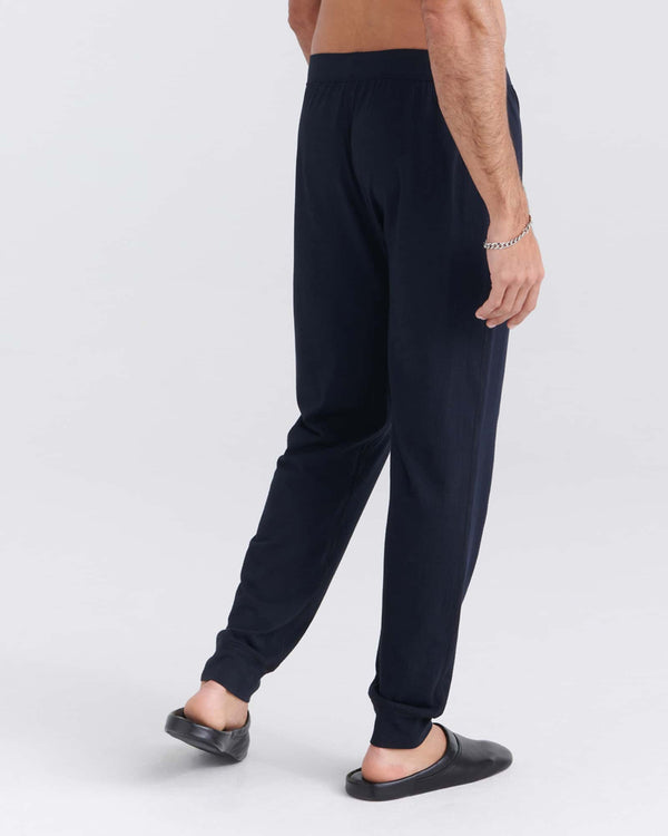 Back - Model wearing Droptemp Cooling Sleep Pant Fly in Black