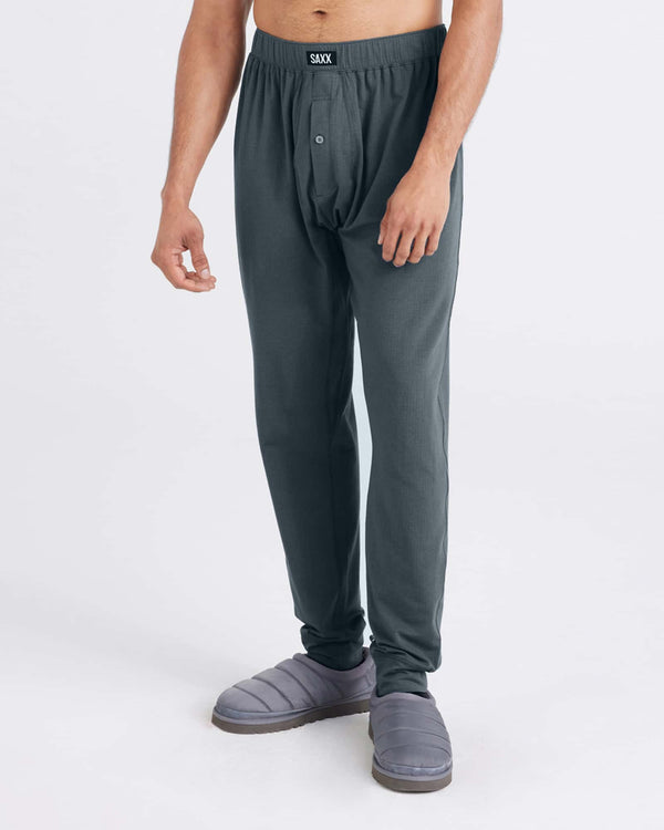 Front - Model wearing Droptemp Cooling Sleep Pant Fly in Turbulence