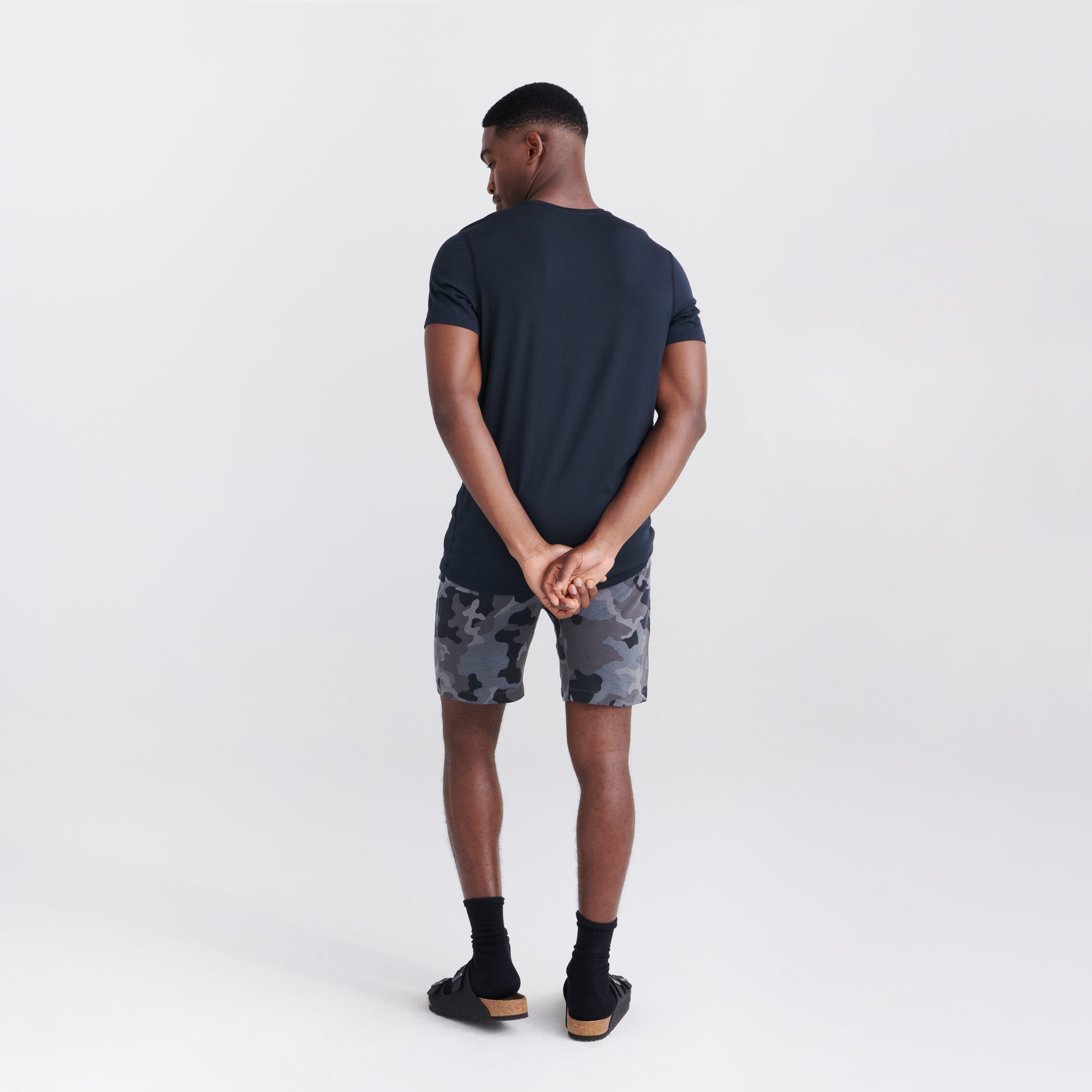 Back - Model wearing Snooze Sleep Short in Supersize Camo- Dark Charcoal