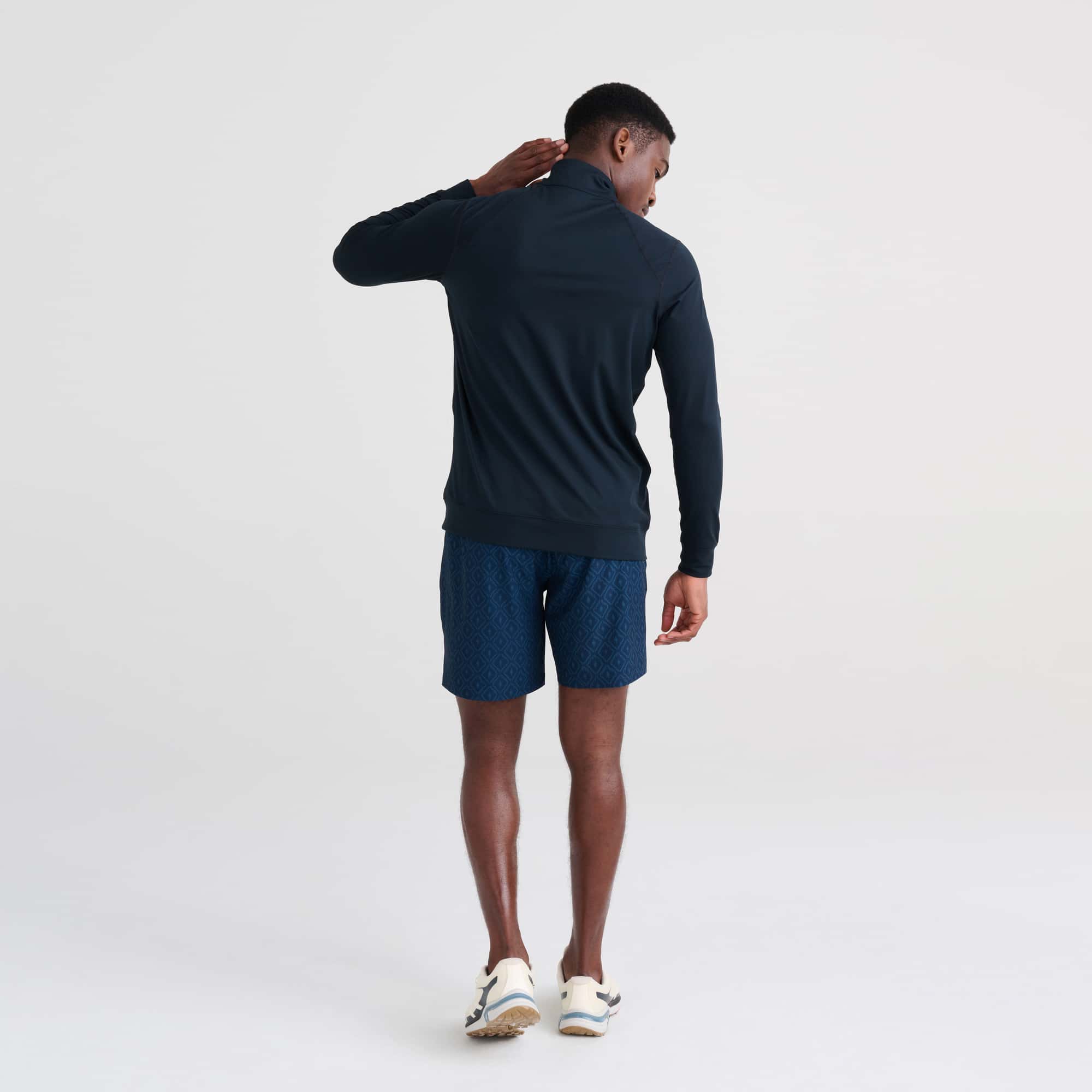 Back - Model wearing Multi-Sport 2N1 Short Regular in Ikat Check- Navy