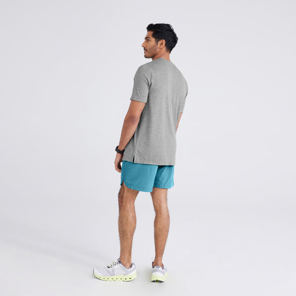 Back - Model wearing  Droptemp® All Day Cooling Short Sleeve Tee in Tradewinds Heather and  Gainmaker 2N1 Short Regular in Hydro Blue