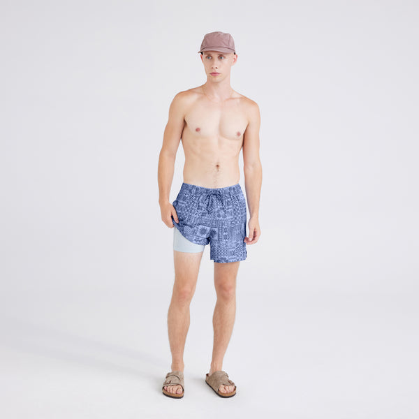 Front - Model wearing  Oh Buoy 2N1 Swim Short Trunk in Tropical Tapa-Lavender