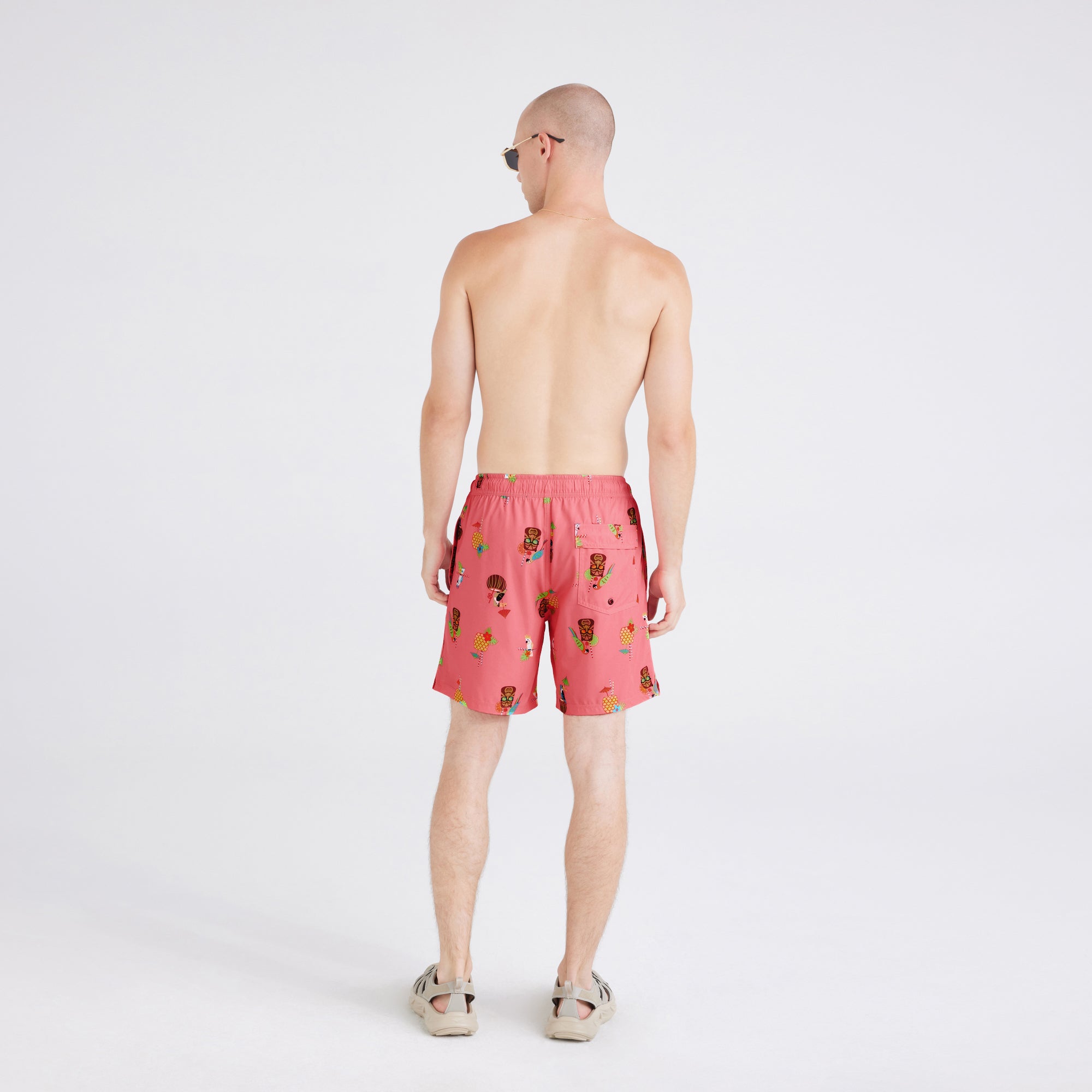 Back - Model wearing  Oh Buoy 2N1 Swim Short Regular in Birds Of Paradise-Coral