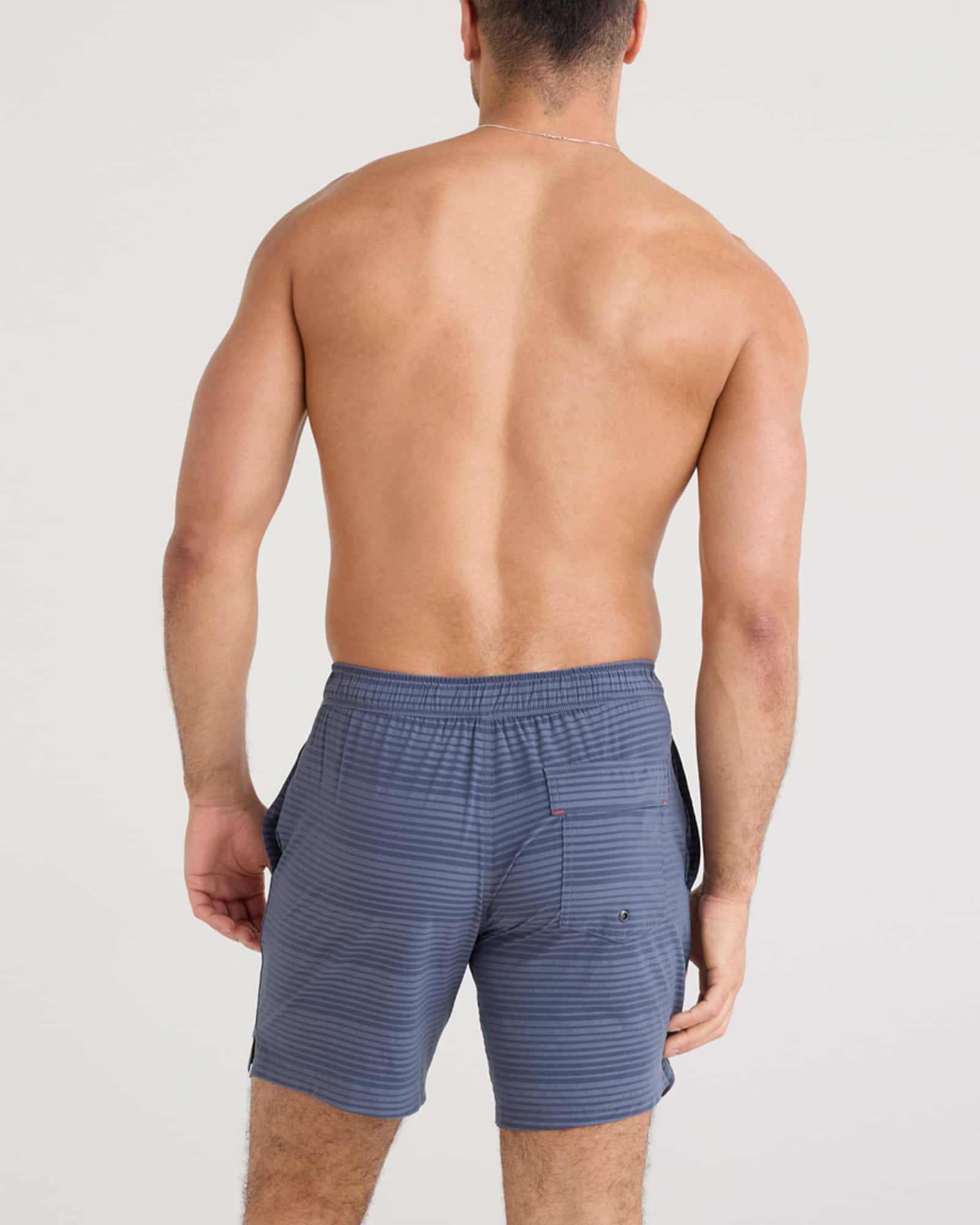 Back - Model wearing Oh Buoy 2N1 Swim Volley 7" in Dark Ink/Deep Navy Stripe