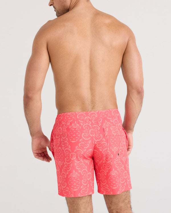 Back - Model wearing Oh Buoy 2N1 Swim Short in Pineapple Brocade-Hibiscus