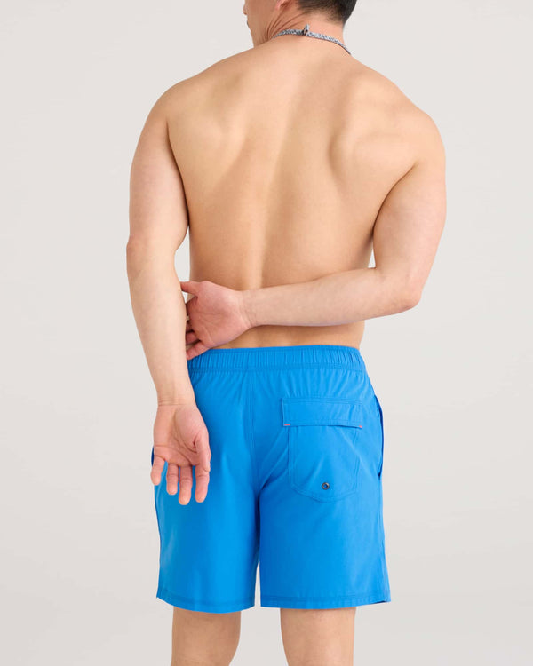 Back - Model wearing Oh Buoy 2N1 Swim Volley 7" in Racer Blue