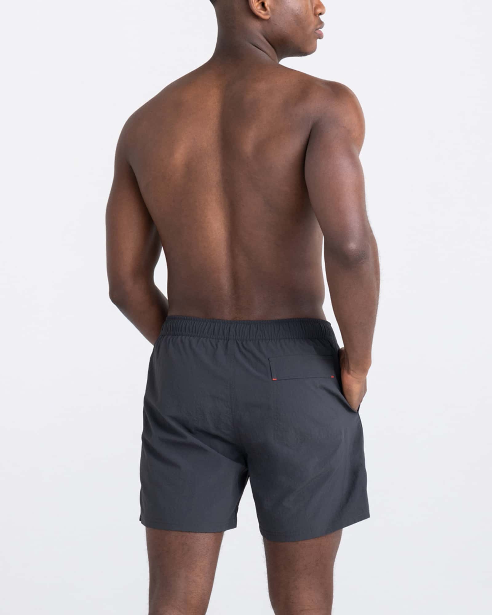 Back - Model wearing Go Coastal 2N1 Volley 5" in Faded Black