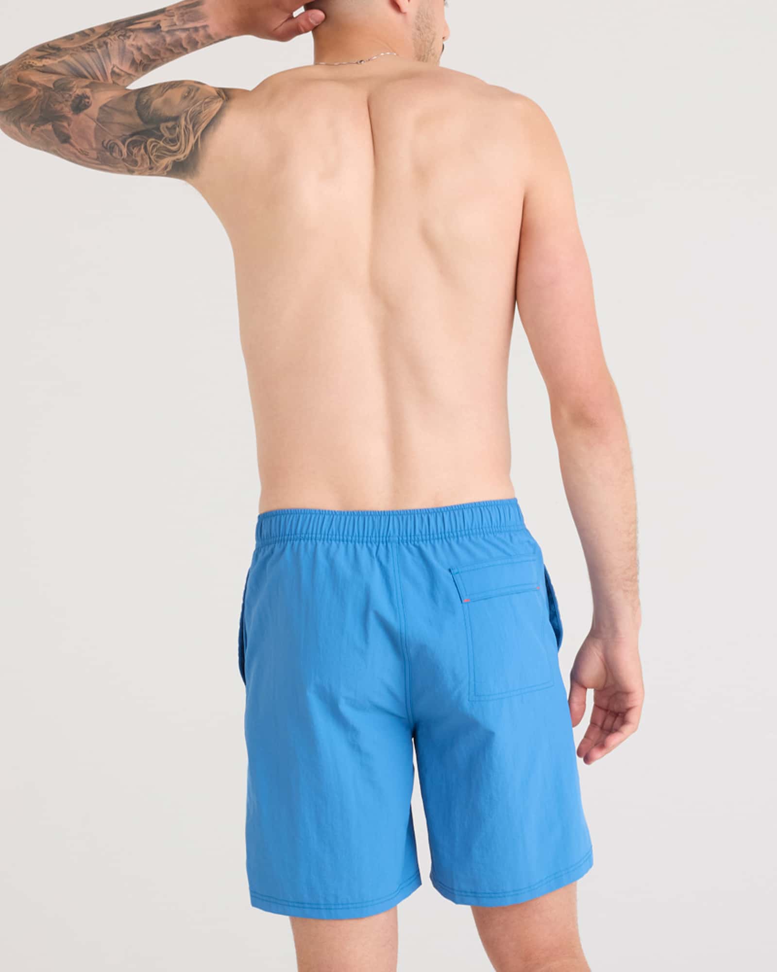 Back - Model wearing Go Coastal 2N1 Volley 7" in Lake Blue