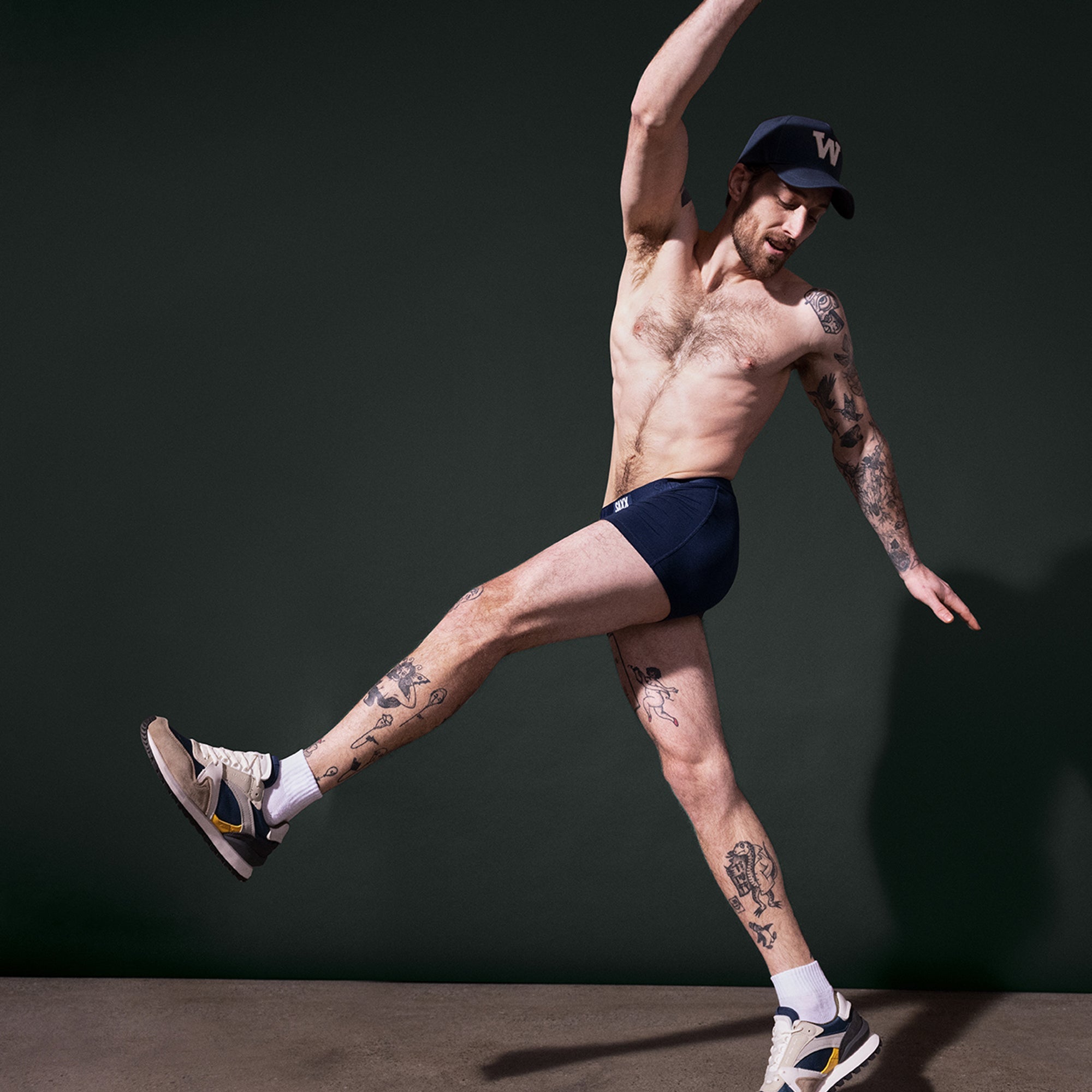 Model posing in Vibe Trunk in Navy Heather