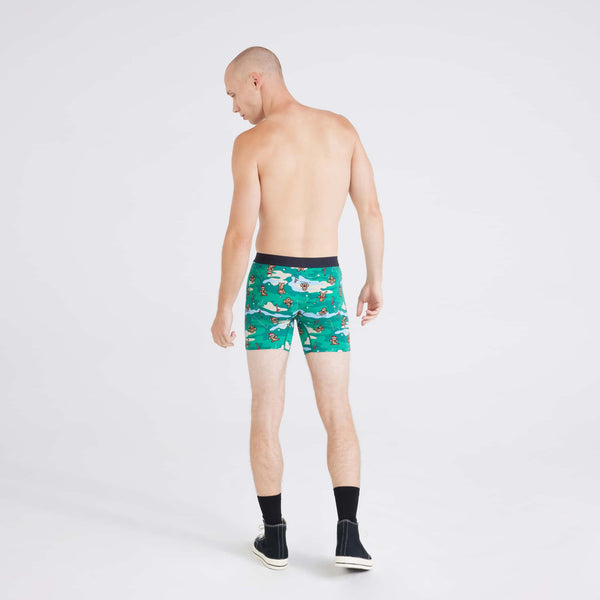 Back - Model wearing Vibe Xtra Boxer Brief in Holiday Par-Tee-Green