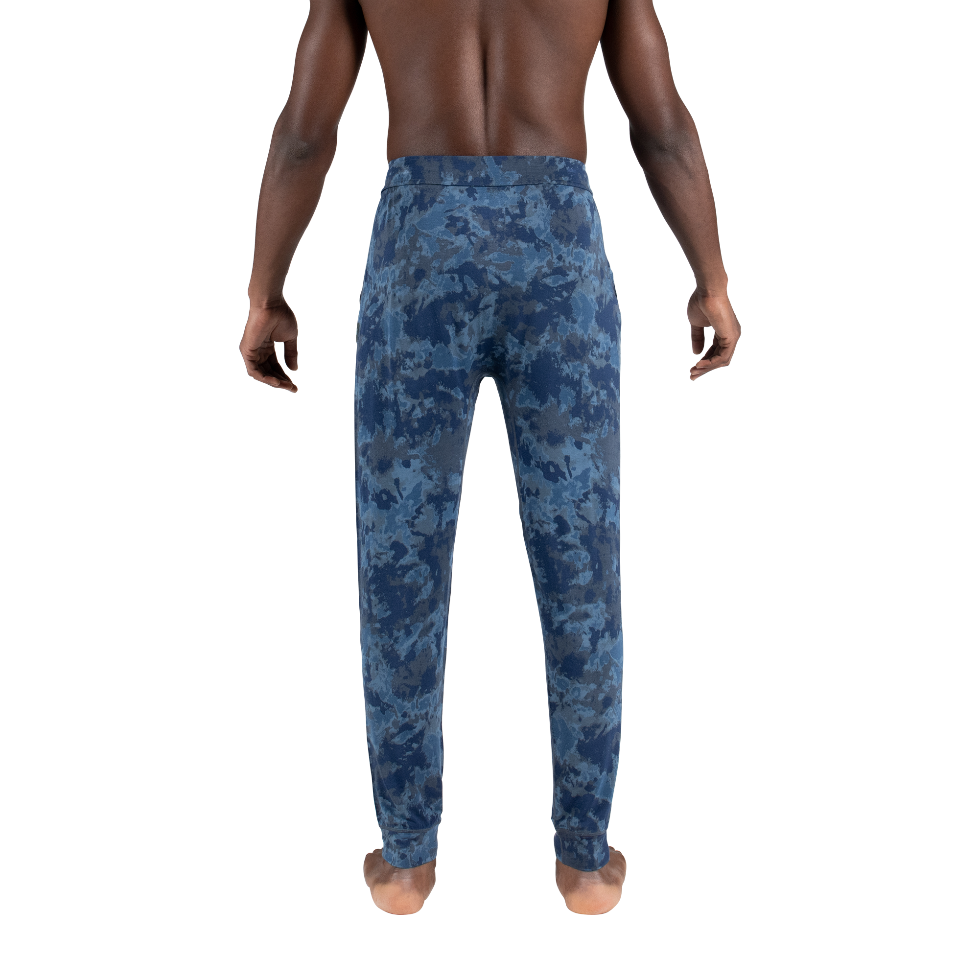 Back - Model wearing Snooze Pant in Smokey Tie Dye- Navy