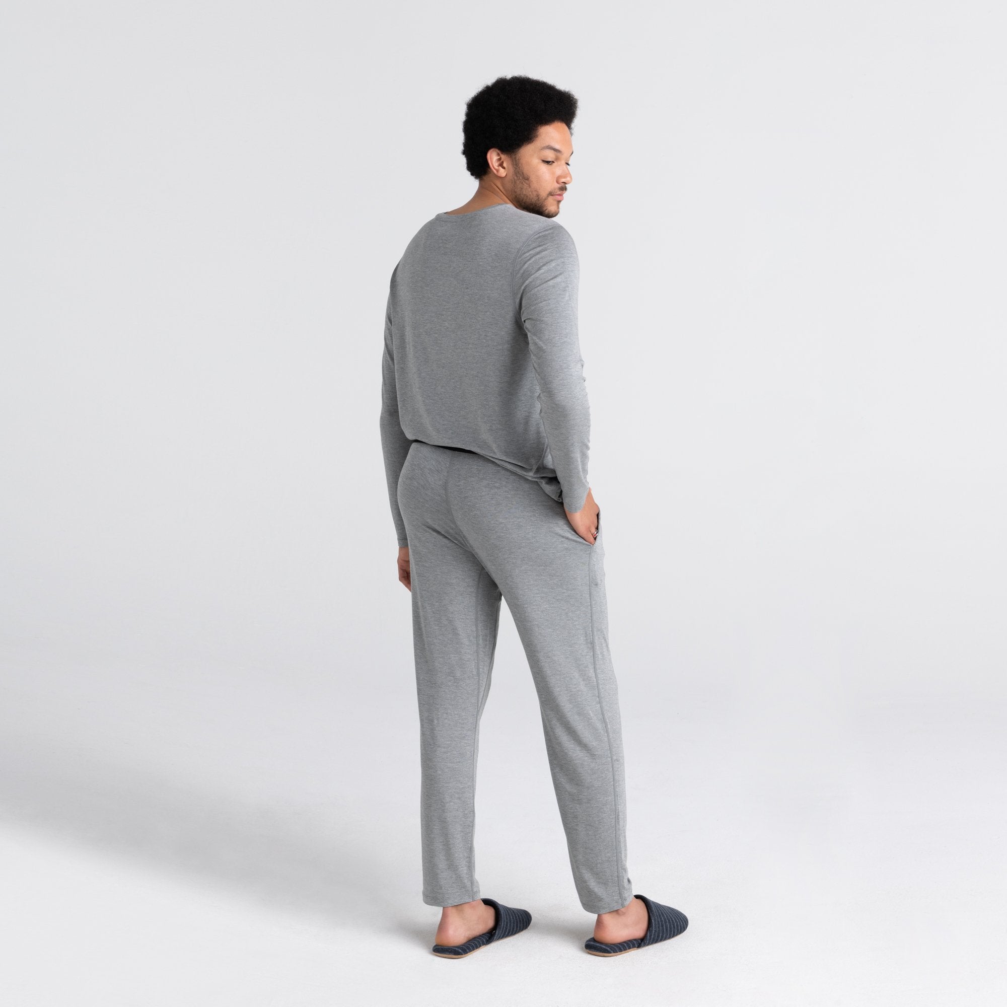 Back - Model wearing Sleepwalker Long Sleeve Pocket Tee and Sleepwalker Pant in Dark Grey Heather