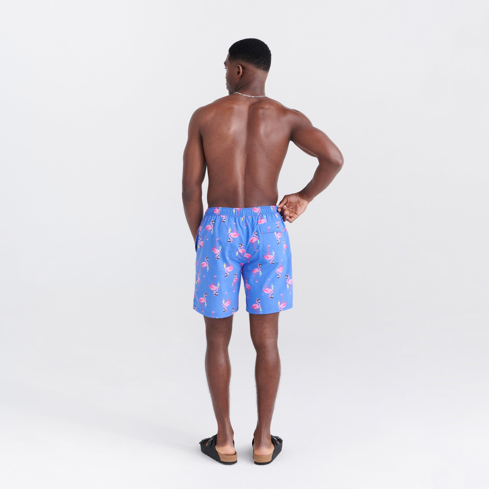 Back - Model wearing Go Coastal 2N1 Swim Classic Volley 7" in Flocktail Hour-Sport Blue